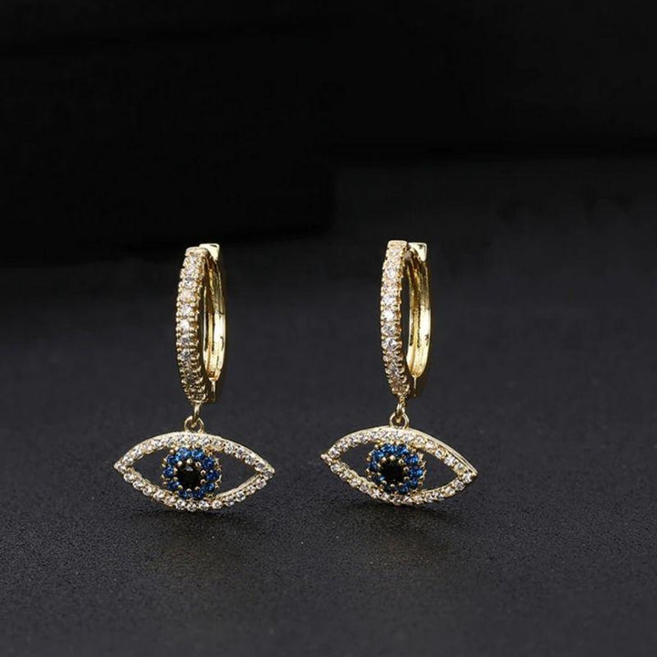 Goldene Ohrringe aus Zirkonia Steinen mit Fatima Augen