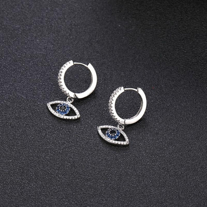 Silberne Ohrringe aus Zirkonia Steinen und Fatima Auge 