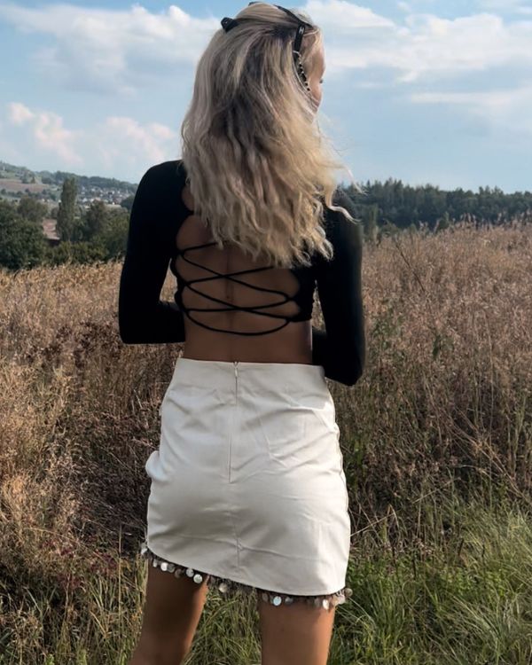 Creme Weisser Boho Rock mit runden Anhaengern