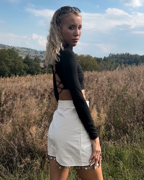 Damen Rock Kurz mit Reissverschluss und flachen runden Anhaengern 