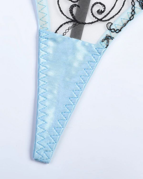 String Tanga mit hellblauem Rand und Spitzen Stoff in schwarz