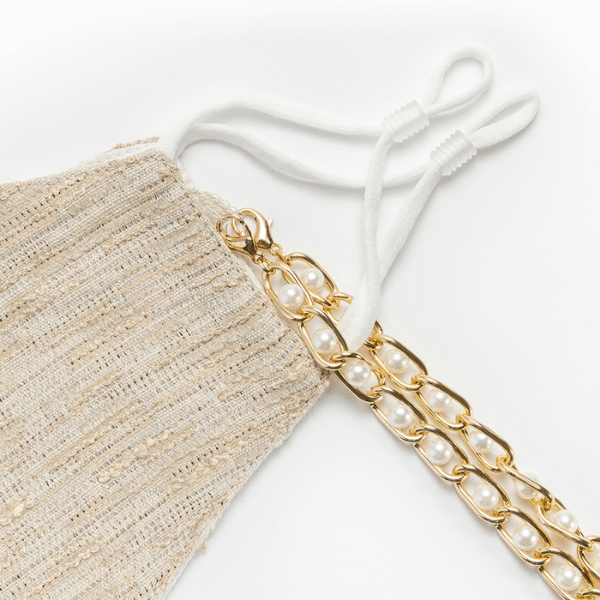 Designer Seidenmaske Schweiz | Ibiza Style Stoffmaske aus Seide und Baumwolle | Maskenkette und Maske in einem | Perlenkette in gild und einzigartige beige goldene Maske | Island Masken Kollektion Schweiz