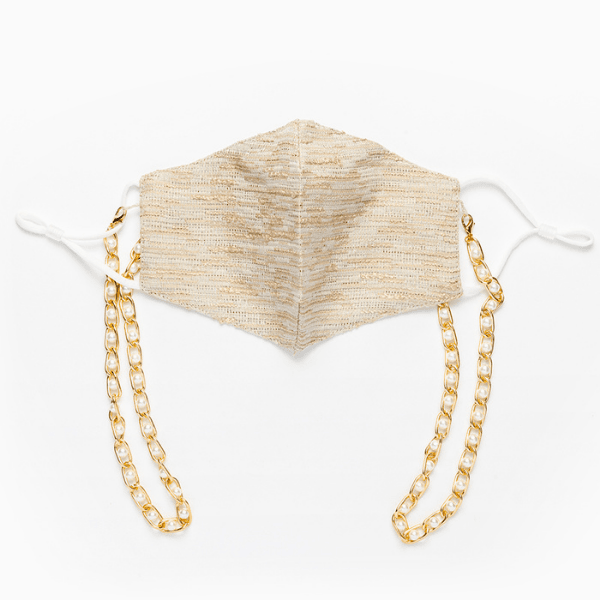 Designer Seidenmaske Schweiz | Ibiza Style Stoffmaske aus Seide und Baumwolle | Maskenkette und Maske in einem | Perlenkette in gild und einzigartige beige goldene Maske | Island Masken Kollektion Schweiz