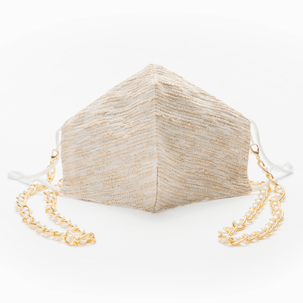 Designer Seidenmaske Schweiz | Ibiza Style Stoffmaske aus Seide und Baumwolle | Maskenkette und Maske in einem | Perlenkette in gild und einzigartige beige goldene Maske | Island Masken Kollektion Schweiz