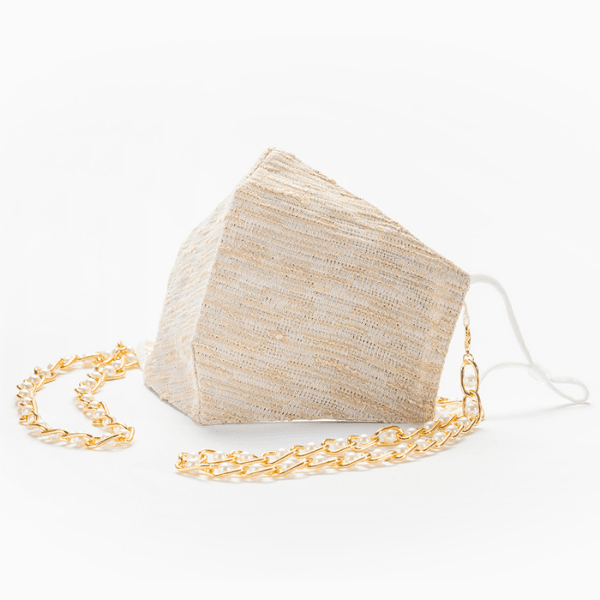 Designer Seidenmaske Schweiz | Ibiza Style Stoffmaske aus Seide und Baumwolle | Maskenkette und Maske in einem | Perlenkette in gild und einzigartige beige goldene Maske | Island Masken Kollektion Schweiz